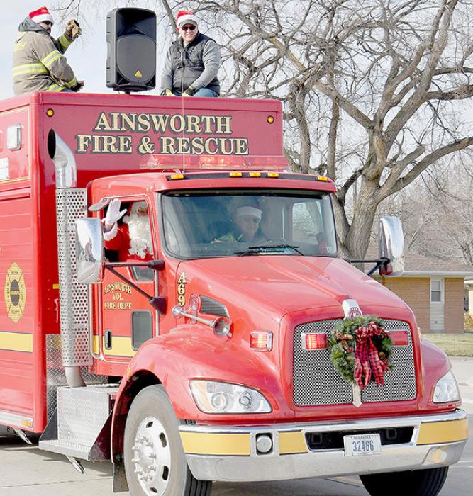 Prior to visiting with children, the Ainsworth Fire Department lead a parade through Ainsworth visiting the Sandhills Care Center and Cottonwood Villa.