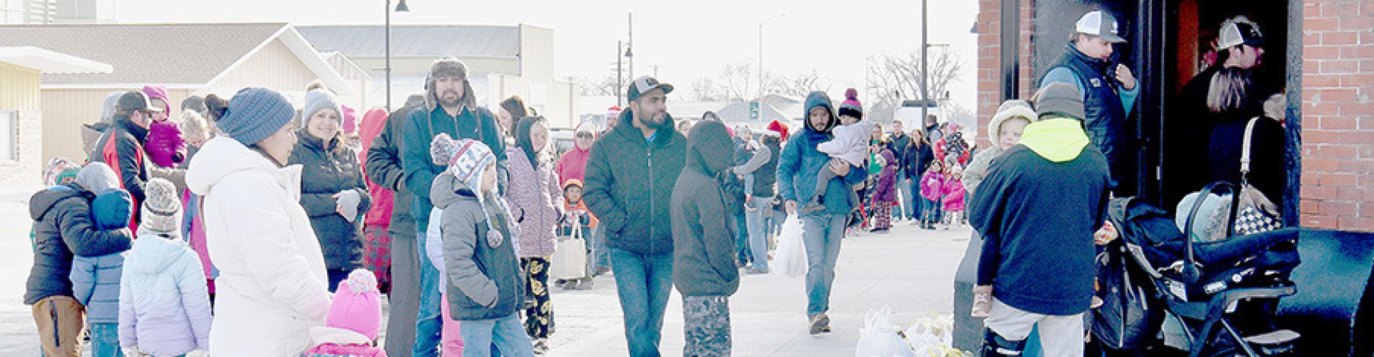 The Chamber event started at 1:00 p.m. on Sunday, December 1st and families were lined up for over a half block waiting their turn to sit on Santa’s lap and tell him what they would like for Christmas. Luckily it was a little warmer on Sunday afternoon, topping out at about 28 degrees.
