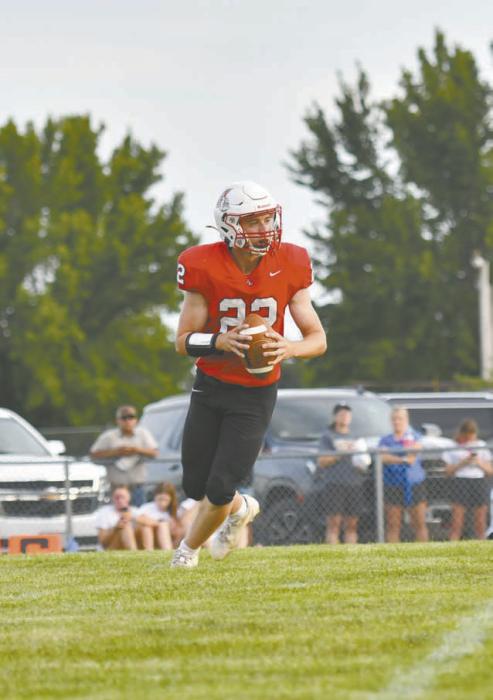 Junior Bear Rea looks up the field to make a pass to his teammate.