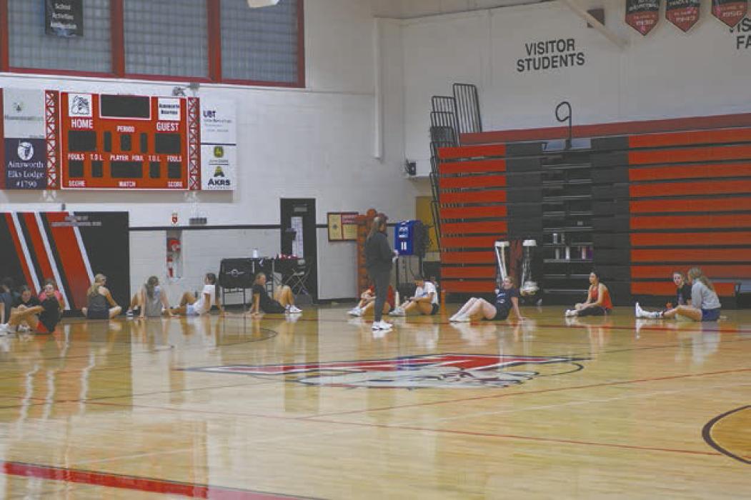Head Coach Jeri Graff explains a workout to the volleyball team during their first day of conditioning.