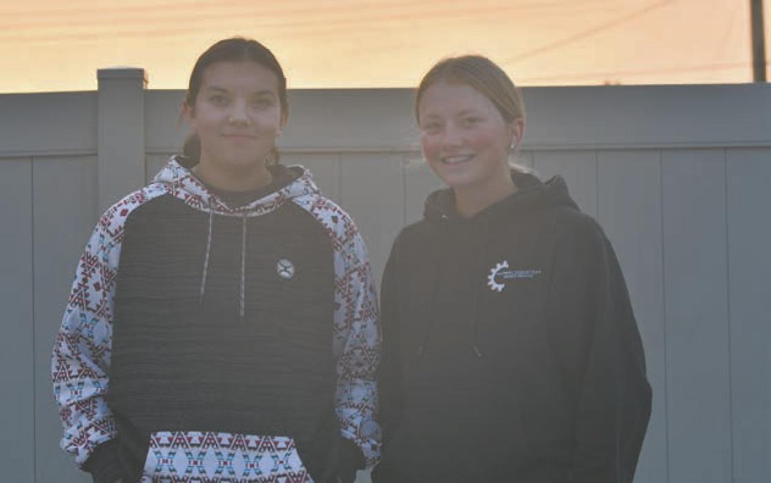 Braylin Rudnick (left) and Kenley Welke (right) joined head girls golf coach Jessica Kempcke during their second day of conditioning week.