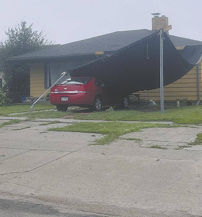 A portable carport on North Elm Street in Ainsworth was destroyed by the high wind on Saturday afternoon.