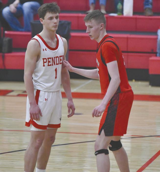 Sophomore Jacob Ortner plays defense on Pender’s Trevor Trimble. Ortner led the team in blocks, with seven this season.