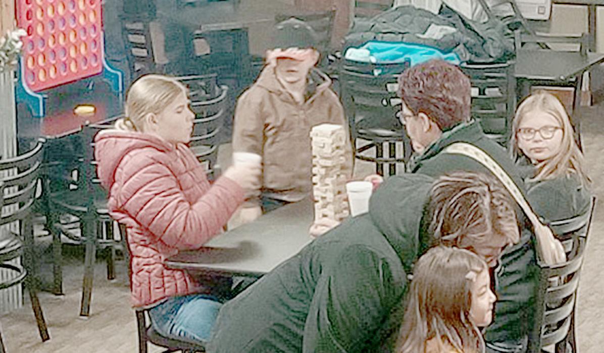 The entire day was spent getting families out and having a good time playing games such as Tic-Tac-Toe, Checkers, Jenga and Connect Four after seeing Santa and Mrs. Claus.