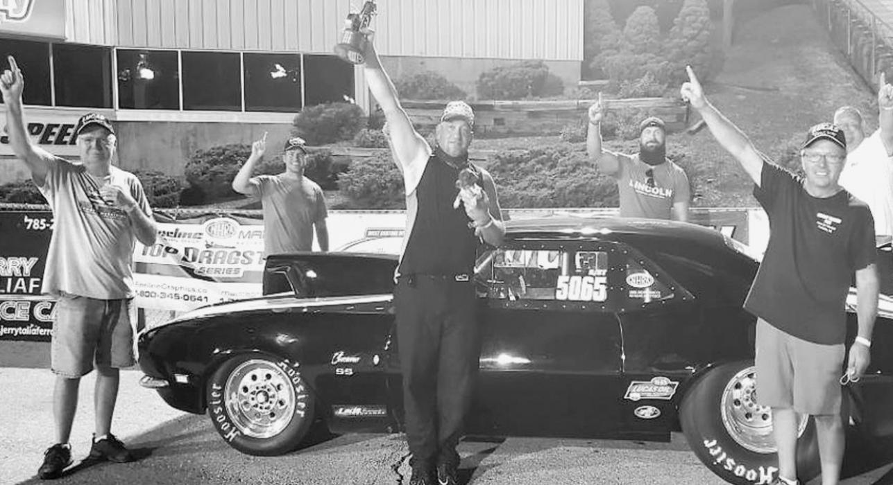 VonHeeder and his dog Gabby – who hasn’t missed a race since birth – celebrate his Topeka Wally win with some of his closest racing buddies.
