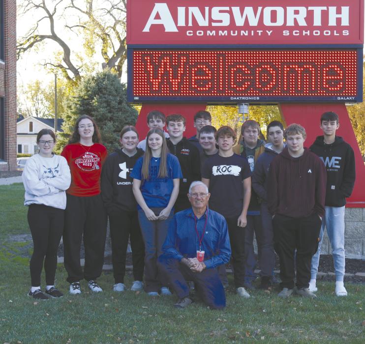 Over the course of the semester, the Ainsworth eighth grade class got to know veteran Joel Ferris, who shared his story of becoming a veteran and the aftermath. The class shared Joel’s story during the Veterans Day program at Ainsworth High School on November 11. Photos of the program will be in the November 19 issue of the Ainsworth Star-Journal.