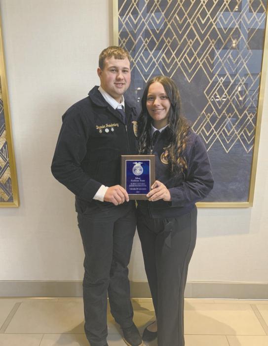 Brandon Freudenberg and Ella Dailey got silver in their ag demo for trimming horse hooves.