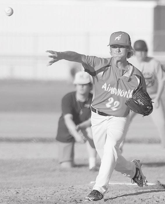 Branson Anderson of Bassett throws a pitch towards the home plate during Ainsworth’s game against Winner on Wednesday, June 2nd.