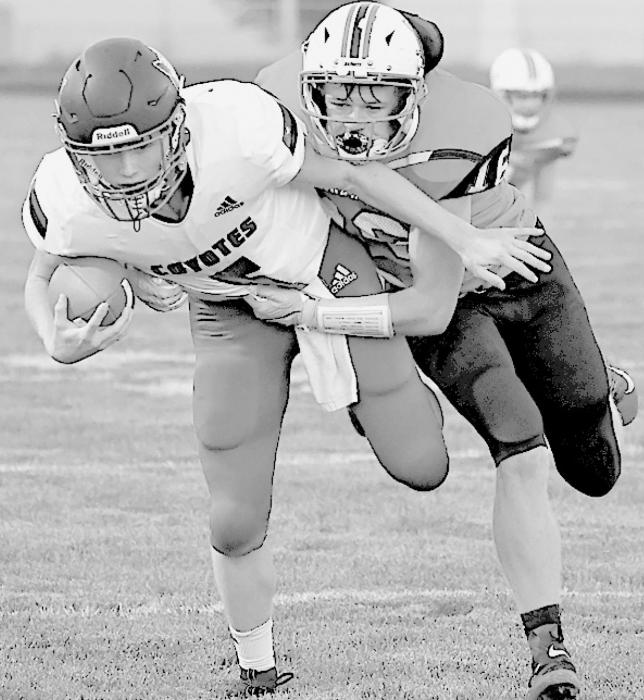 Senior Cash Reynolds catches Anselmo-Merna quarter-back Carter Johnson from behind.