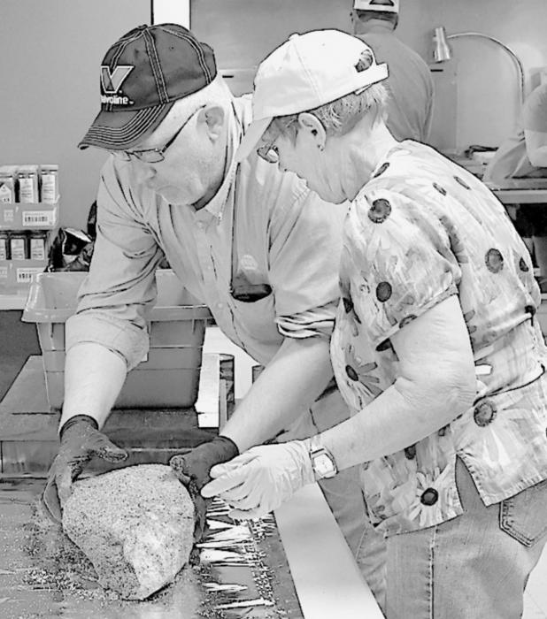 Each year Sherman has provided his expert services in cooking the meat for the fair barbecues.