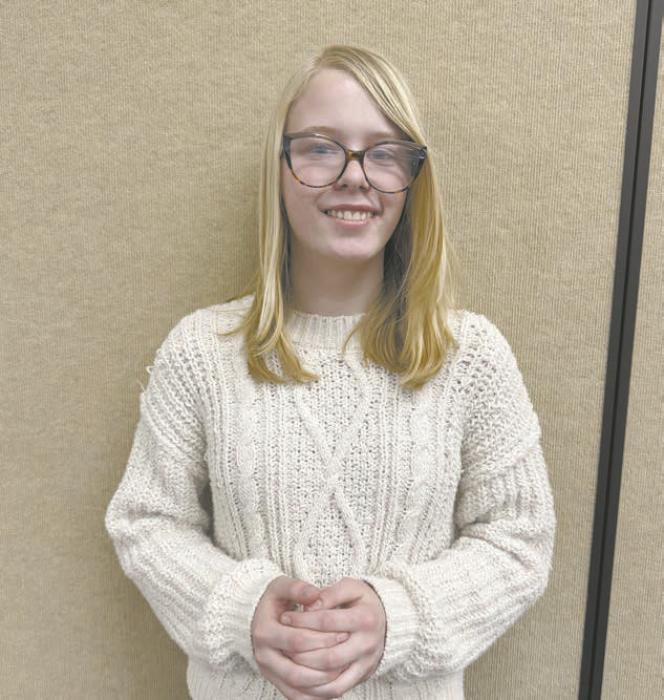Carter Cozad wrote a historical paper on the Counter Reformation, and she placed first.