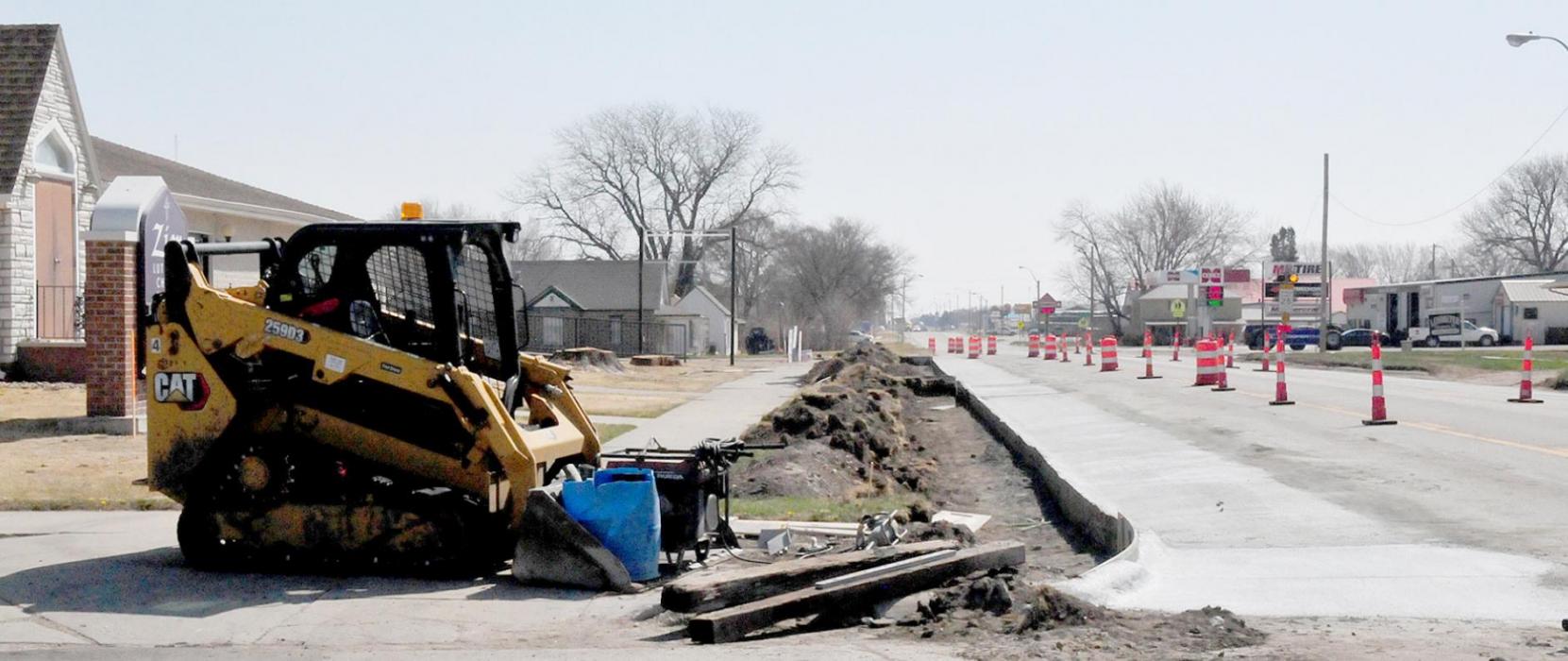 The west edge of town was also widened on the north side of the highway. That can be seen in the photo above, where new cement was laid on the north side of the highway in front of the Zion Lutheran Church. This was also done so that eventually, the highway will be three lanes across all the way through town.