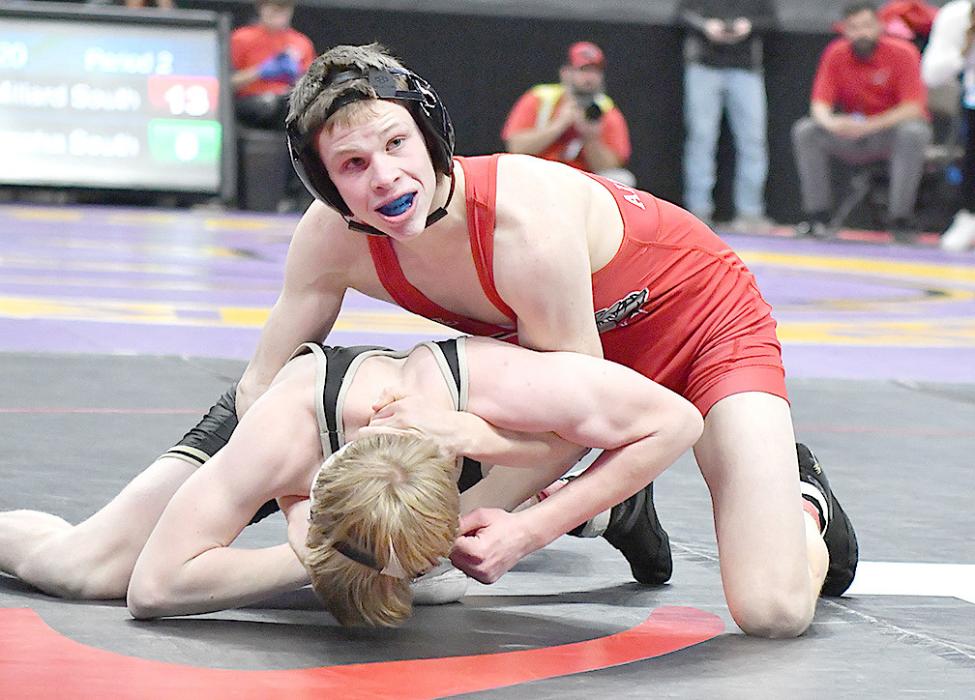 Dylan Titus looks to the ref as his match against Truska of Aquinas Catholic runs out of time.