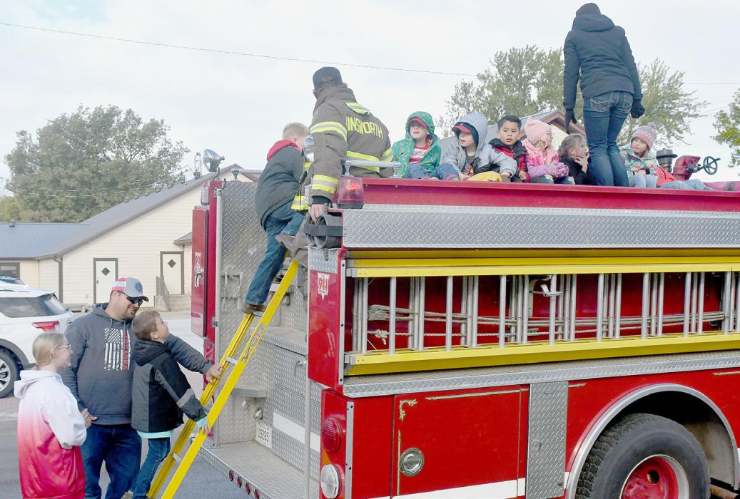 During Fire Prevention Week, Ainsworth Fire and Rescue members talked to students at Little Paws, Ashley Titus Day Care and Ainsworth Schools about Fire Prevention. The students are also assisted by the firemen, to safely get on the fire trucks, followed by a ride around town.