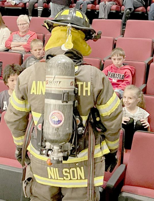 Firemen BJ Nilson suited up in full gear and talked to students about fire safety. Photos Courtesy Melissa Freudenburg