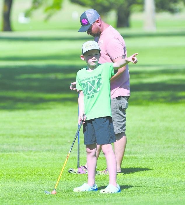 Blake Winters points out where he is aiming as he prepares to take a swing.