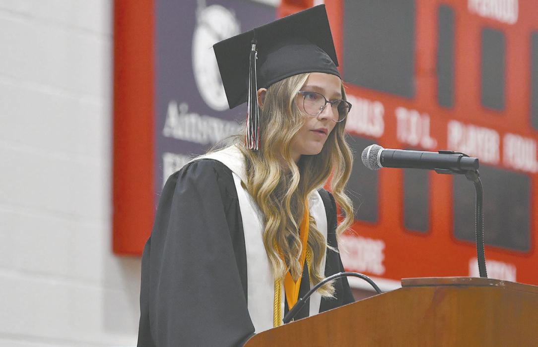 Emma Kennedy delivers her Summa Cum Laude speech, reminiscing on the years she spent with classmates in Ainsworth.
