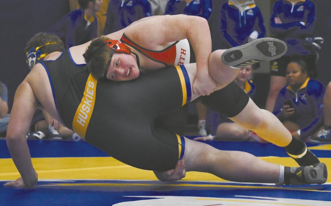 Ainsworth sophomore John Lewis takes down his opponent from West Holt during the West Holt Quadrangular on Thursday, December 4.