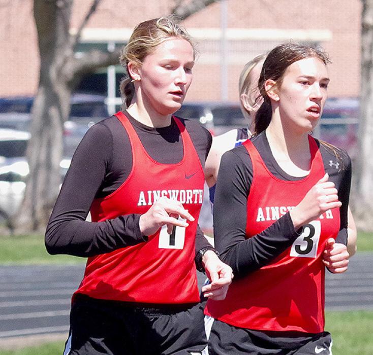 Emma Kennedy (Left) and Katherine Kerrigan (Right) paced each other in the 3200 Meter Run at the O’Neill Track Meet. Kennedy took first place and Kerrigan took second place in the 3200 Meter Run.