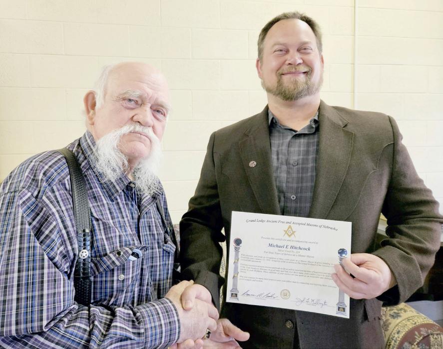 Michael E. Hitchcock (Left) of Silver Cord Lodge #224 of Ainsworth was presented with his sixty years of Service as a Master Mason. The pin and certificated were presented to him by his son, Luke Hitchcock (Right).