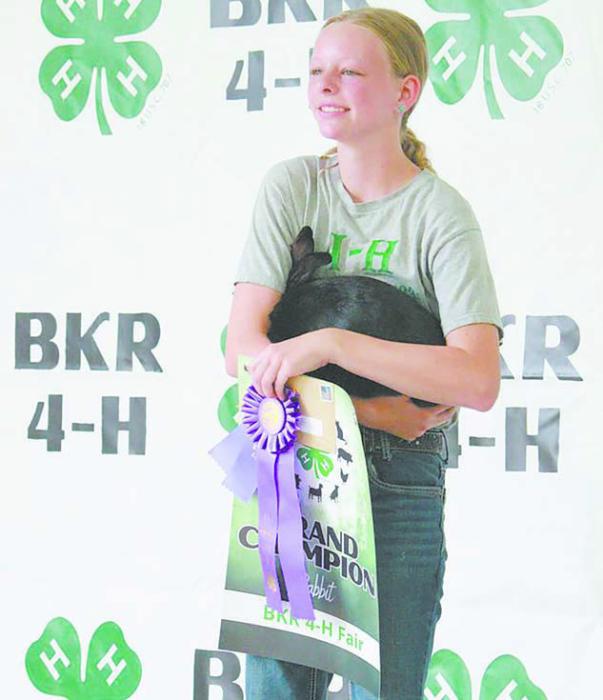 Elise Dvorak and her rabbit were awarded as “Champion Rabbit”. Photo Courtesy of Hannah Keller