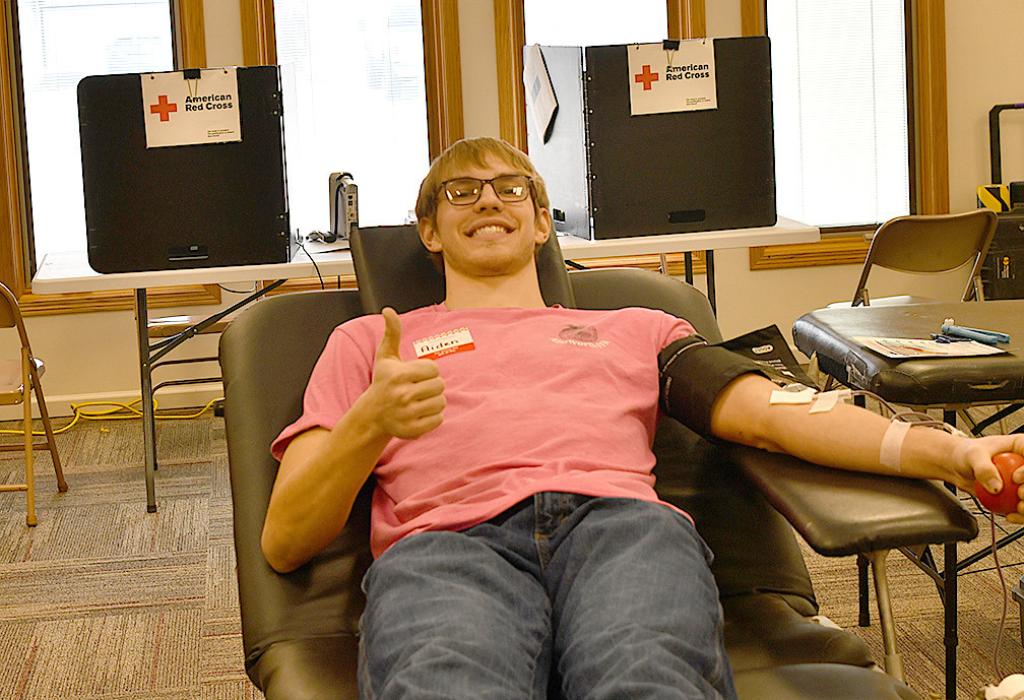 Senior FFA Sentinel Aiden Jackman gets his blood drawn for the first time at the FFA Blood Drive.