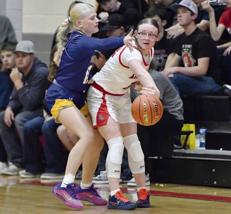 Gracyn Painter throws a wrap-around pass to her teammate.