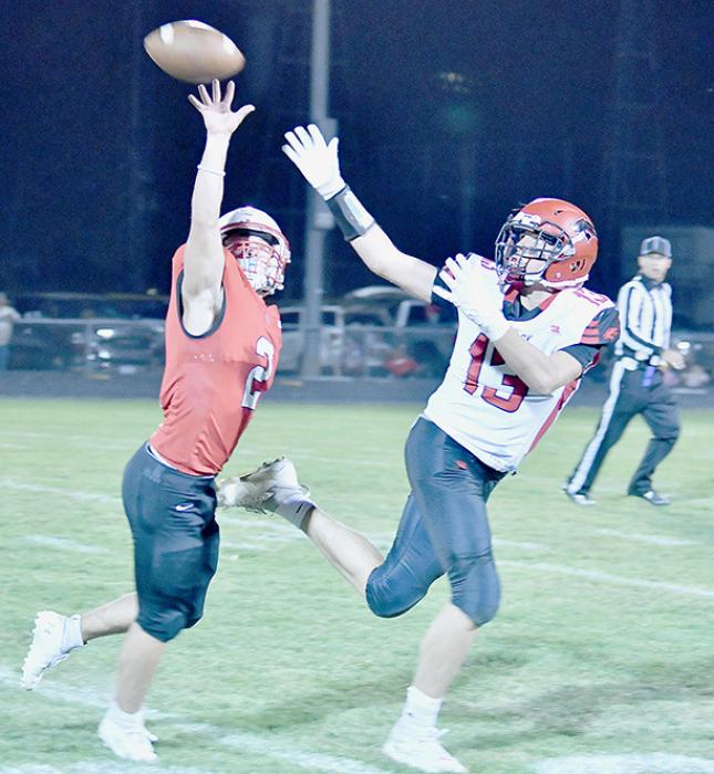 Morgan Kinney, #2, stretches out and tips a pass that would have resulted in a long gain for EPPJ.