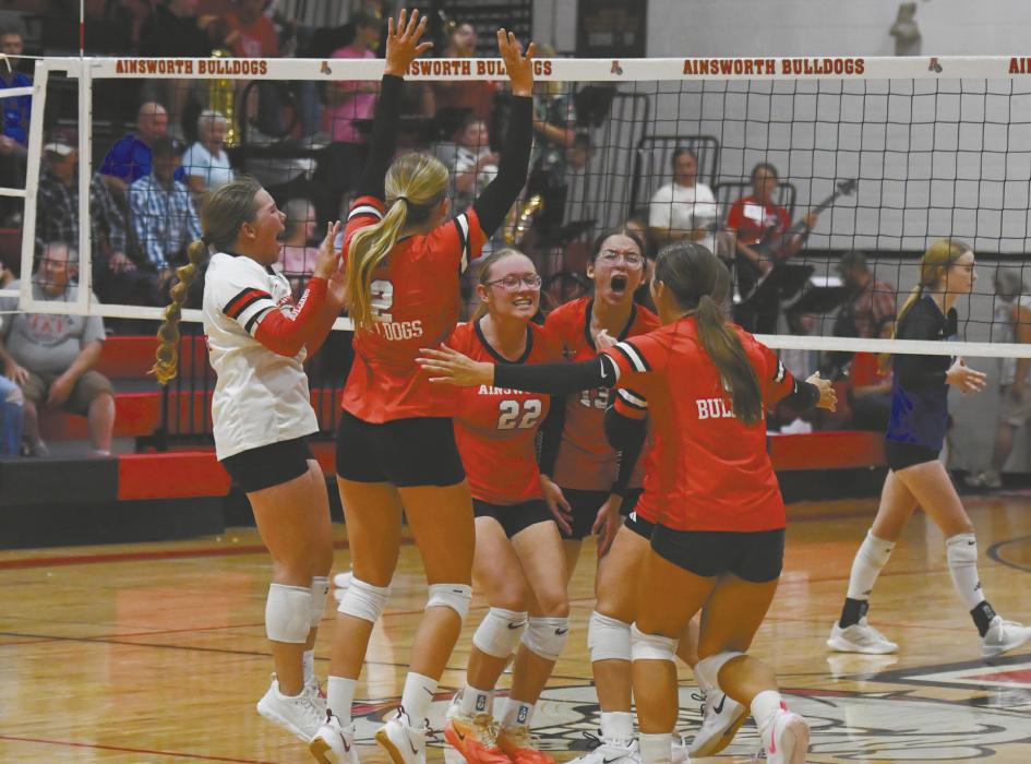 The Lady Bulldogs converge to celebrate a massive game-ending block by junior Raelynn Reagan. The team had not beat the Knights any of the pair's four meetings last season and the team showed much excitement breaking the dry spell.