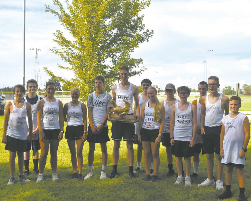 The team called “Hen Hustlers” won the Ainsworth high school and middle school cross country team’s annual chicken run on Thursday, September 3. The team consisted of (left - right): Paul Denny, Onyx Morse, Addilyn Doke, Izzy Painter, Holden Beel, Kaden Seidel, Leighton Konkoleski, Kiley Orton, Mason Winters, Mason Shepperd, Jon Strand, Buck Ruhter, and Jett Hansmeyer. The Bulldogs used the opportunity to prepare for their first regular sesason competition in Ainsworth on September 4.