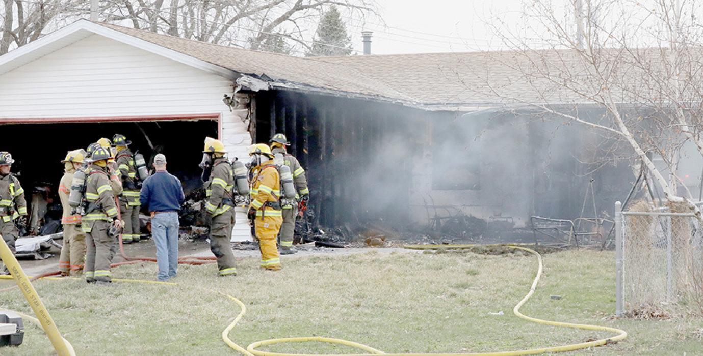 The Ainsworth and Long Pine Fire Departments responded to a house fire on Friday afternoon, April 5th. The house owned by Andy and Dr. Bea Taylor received extensive damage, primarily to the north side of the garage and entry way into the house. Photos by Debb Gracey