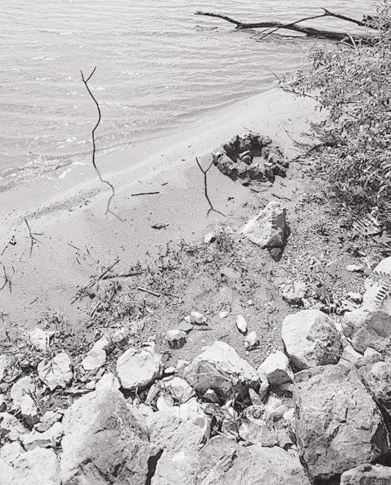 Litter is left along the shoreline at Pawnee State Recreation Area in Lancaster County. (Nebraskaland Magazine/NGPC)