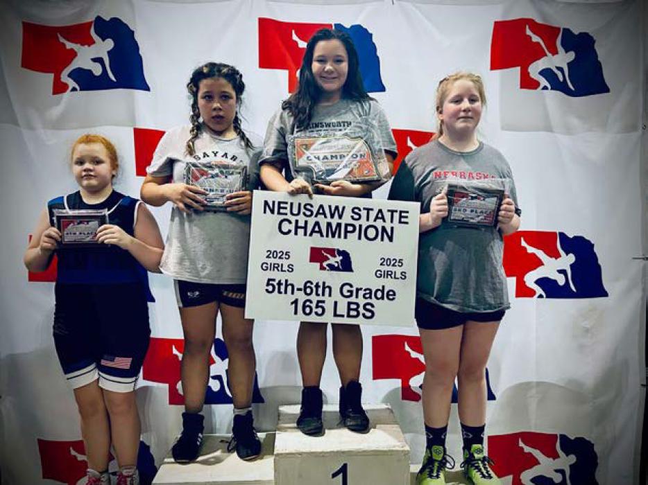 Adeline Hladky (third from left) placed first at the NEUSAW State Wrestling Championships. Hladky wrestled in the 165 pound weight class, in the 5th and 6th grade division. Other local wrestlers competing at this meet were Mason Winters (8th place), Preston Winters (6th place), Dallyn Dailey (2nd place), and Chazlee Dailey (6th place.)