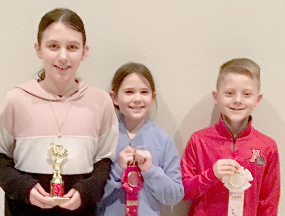 Third Grade Spelling Bee winners: (Left to Right) 1st - Sutton Owen, 2nd - Rowan Alberts and 3rd - Landon Arens.