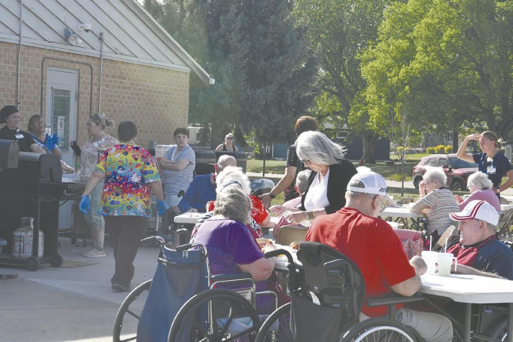 On May 13, the Care Center held a barbeque serving hot dogs, hamburgers, potato salad, and drinks. .
