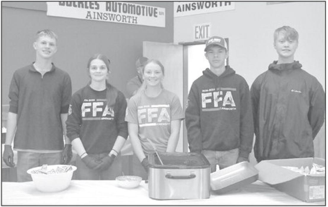 The Ainsworth FFA Chapter annually serves at the fair’s barbecue. This year, FFA representatives were (left - right): Barrett Keller, Londyn Dunbar, Kenley Welke, Holden Beel, and Kristopher Hitchcock. Several other members were in the kitchen preparing sandwiches for these students to serve.