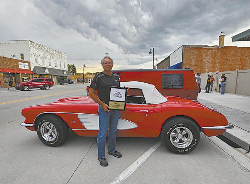 George Murdock won first place in the Vehicle Division. He is pictured with his winning 1959 Chevrolet Corvette.