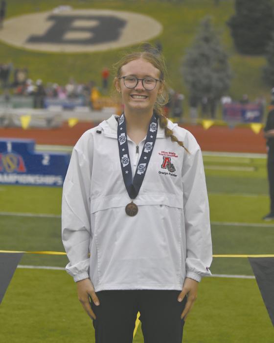 Gracyn Painter placed eighth in the 200 meter dash, running the race in 26.96 seconds. More state track results on page seven.