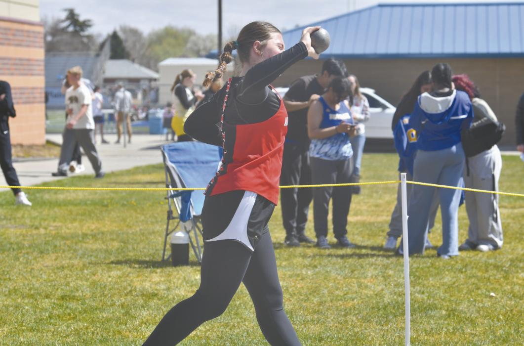 Freshman Addilyn Doke throws the shot put at the Buffalo Bill Invite. Doke threw the shot put 29-2, just 8 inches short of her personal best. She also competed in the 100 meter hurdles (24th place) and triple jump (18th place).