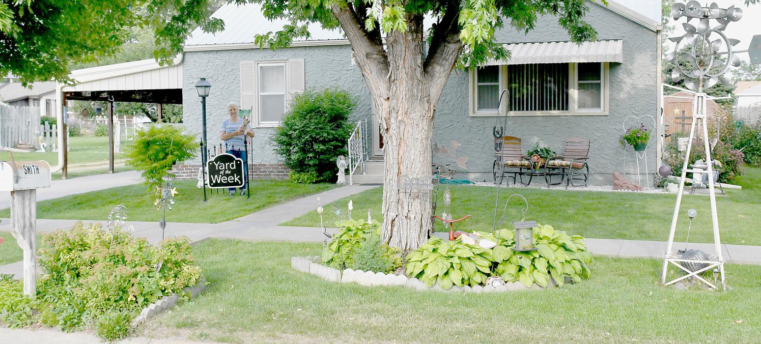Bev Smith Receives This Week’s Chamber Yard of the Week