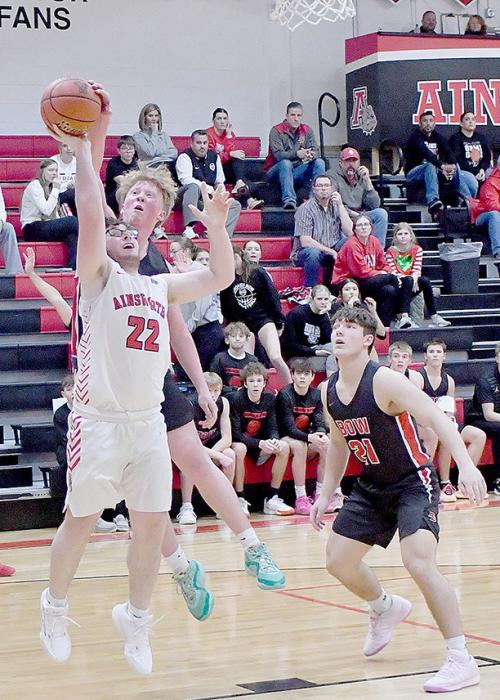 Ainsworth struggled against Broken Bow’s height advantage as shown here with Witten Painter getting the ball knocked away by Broken Bow’s 6’ 2” Drew Ellis.