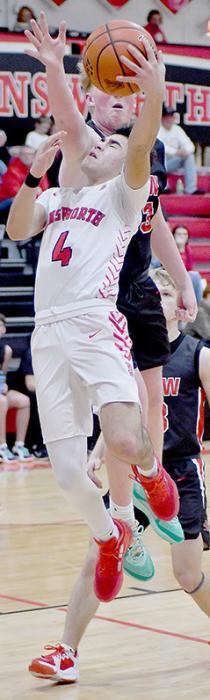 Chris Fernandez drove the lane and avoided Drew Ellis’ block attempt to score two points for Ainsworth.