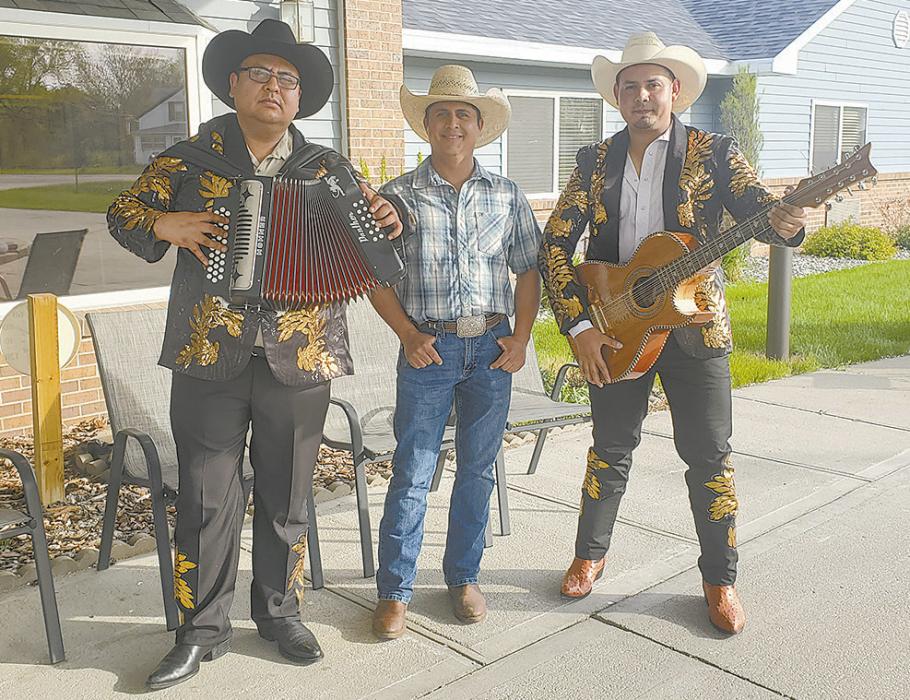 The local band Los Elegantes consists of members (left to right): Francisco Zumano, Thomas Salas, and Uvaldo De Leon.