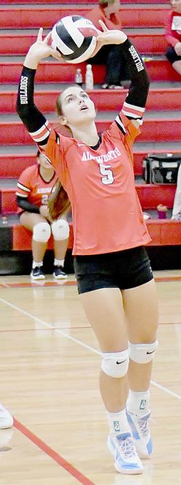 Willa Flynn sets the ball during the game against the O’Neill Lady Eagles.