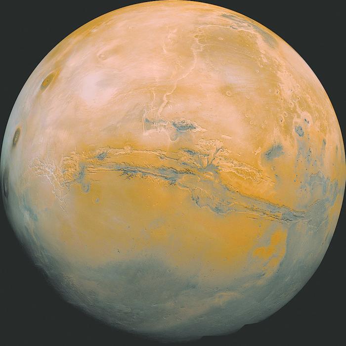 A mosaic of the Valles Marineris hemisphere of Mars projected into point perspective, a view similar to that which one would see from a spacecraft. The mosaic is composed of 102 Viking Orbiter images of Mars. Credit: NASA/JPL-Caltech