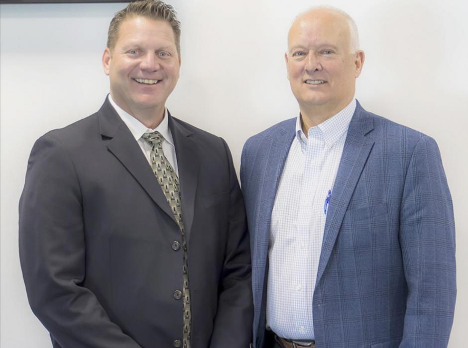 Pictured at the special Law Enforcement Coalition are FBI Assistant Special Agent in Charge Phil Lenz, and Attorney General Doug Peterson. Photo by Laura Vroman