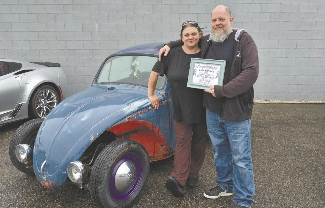 A great turnout of cars, friends, family and community members filled the evening with food, fellowship and plenty of support for Shayne McConnel as he continues his battle with cancer. Pictured are event coordinator Rozalynn Goss and McConnell along with a fitting ending to a special night: Shayne’s own Volkswagen Beetle was voted the People’s Choice winner. He received a $100 H&amp;R Food Center gift certificate with the honor.