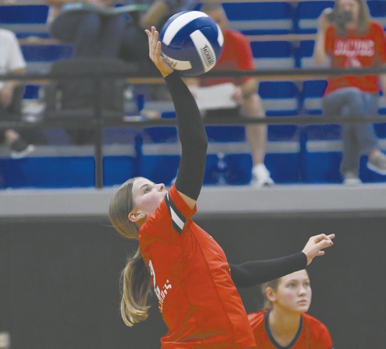 Junior Jaylee Good takes a swing during the Bulldogs’ game against Chambers/Wheeler Central. Good had five kills during the match.