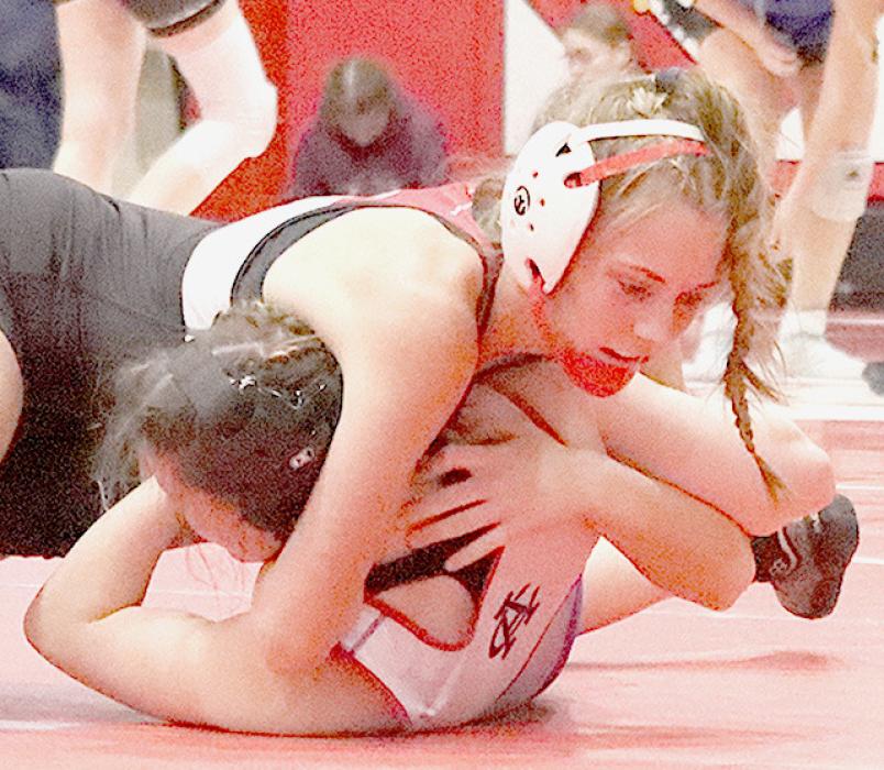 Megan Jones took third place in the 135 lb. weight class at the Plainview Invitational.