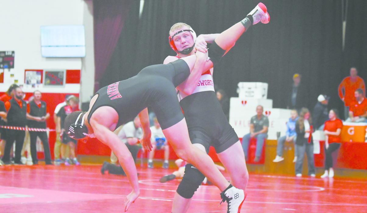 Sophomore Easton McMillin takes down his opponent, Gavin Knajdl of Amherst.